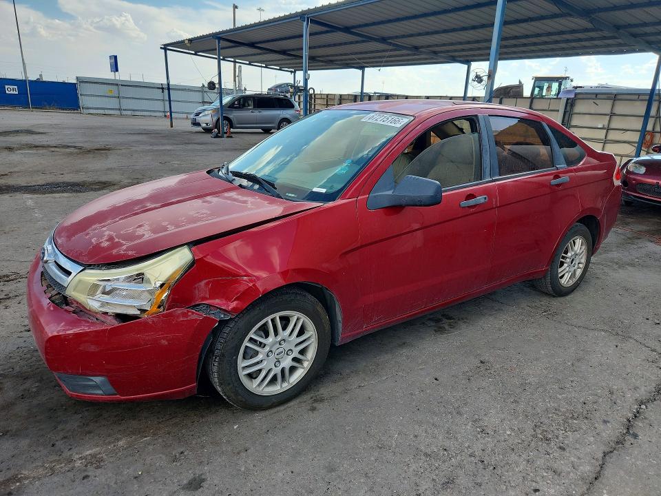FORD FOCUS 2011 with VIN 1FAHP3FN0BW147928 - Photo from auction