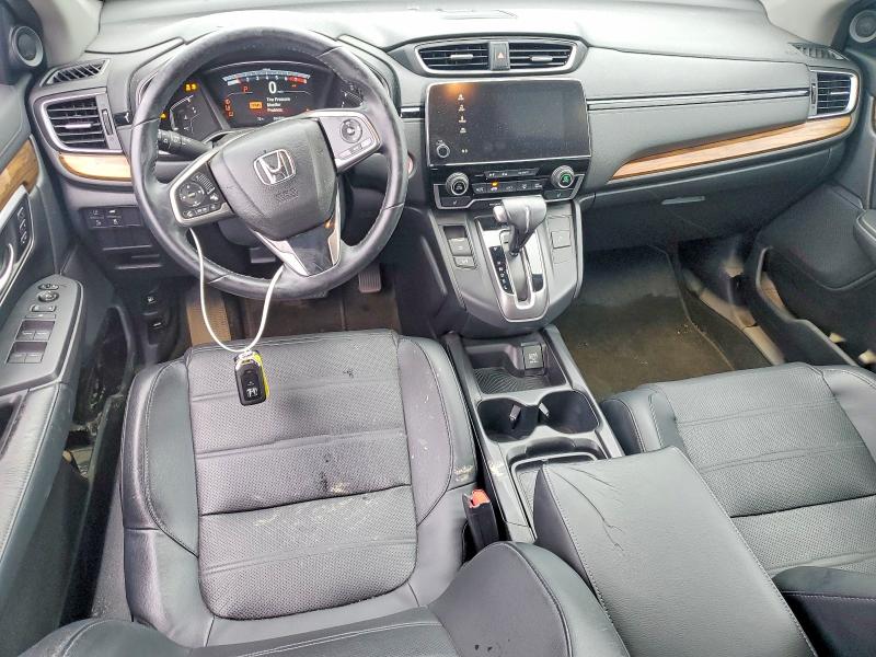 Photo 8 from auction – 2017 HONDA CR-V with VIN 7FARW1H83HE000145