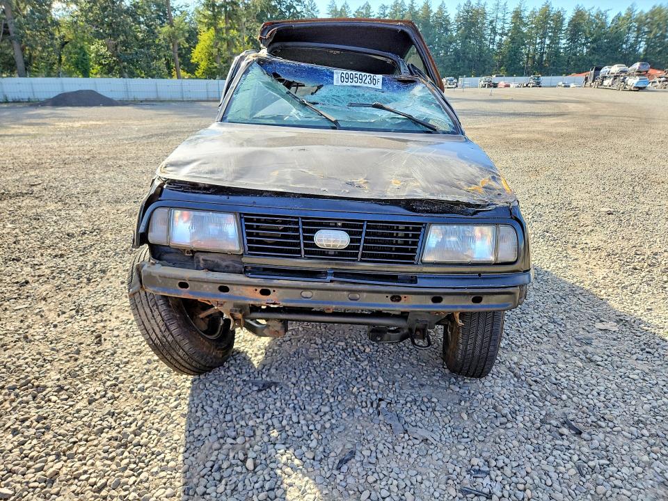 Photo 5 from auction – 1993 GEO TRACKER with VIN 2CNBJ18UXP6935073