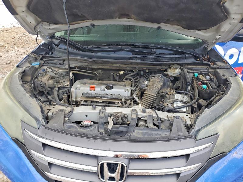 Photo 12 from auction – 2014 HONDA CR-V with VIN 2HKRM3H3XEH562526