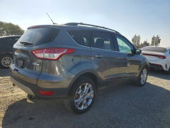 Photo 3 from auction – 2013 FORD ESCAPE with VIN 1FMCU0GX5DUC24704