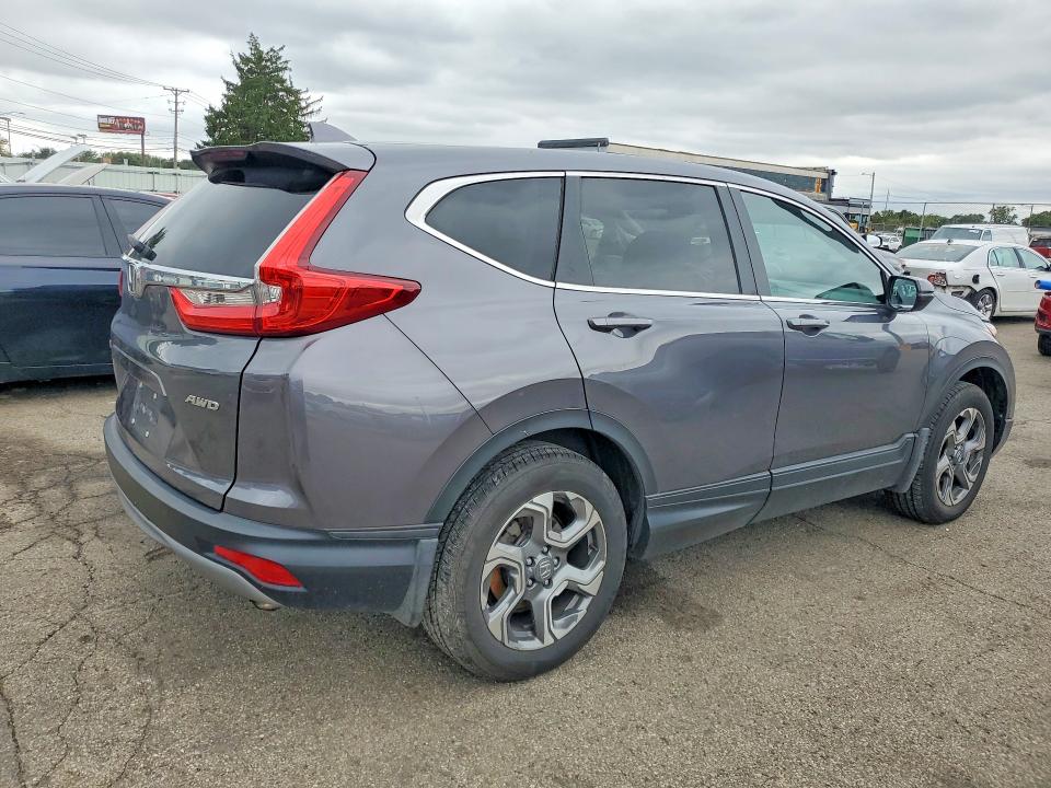 Photo 3 from auction – 2019 HONDA CR-V with VIN 2HKRW2H5XKH674356