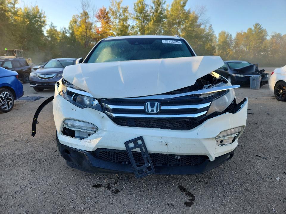 Снимка 5 от търг – 2017 HONDA PILOT с VIN 5FNYF6H7XHB506745