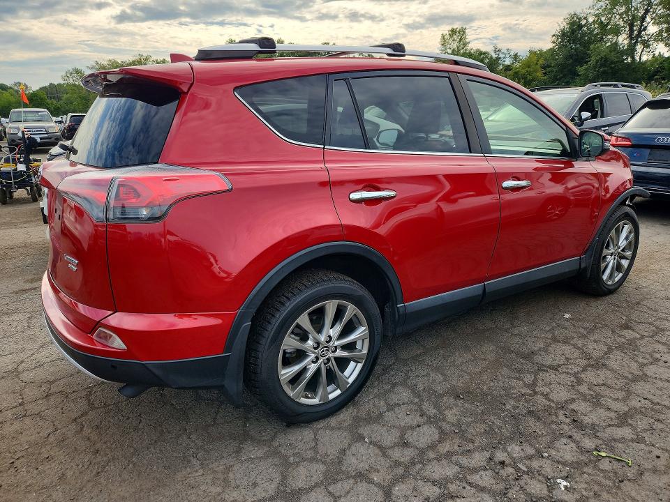 Снимка 3 от търг – 2016 TOYOTA RAV4 с VIN JTMDFREV1GJ072256