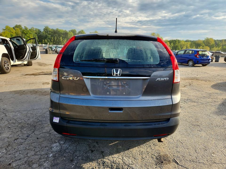 Photo 6 from auction – 2013 HONDA CR-V with VIN 2HKRM4H30DH681450