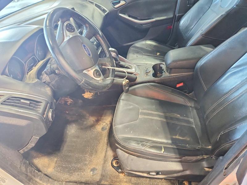 Photo 7 from auction – 2014 FORD FOCUS with VIN 1FADP3N21EL395620