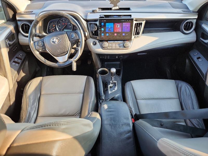 Photo 8 from auction – 2014 TOYOTA RAV4 with VIN 2T3DFREV0EW156986