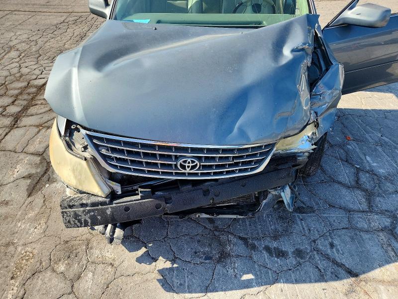Снимка 11 от търг – 2003 TOYOTA AVALON с VIN 4T1BF28B03U277278