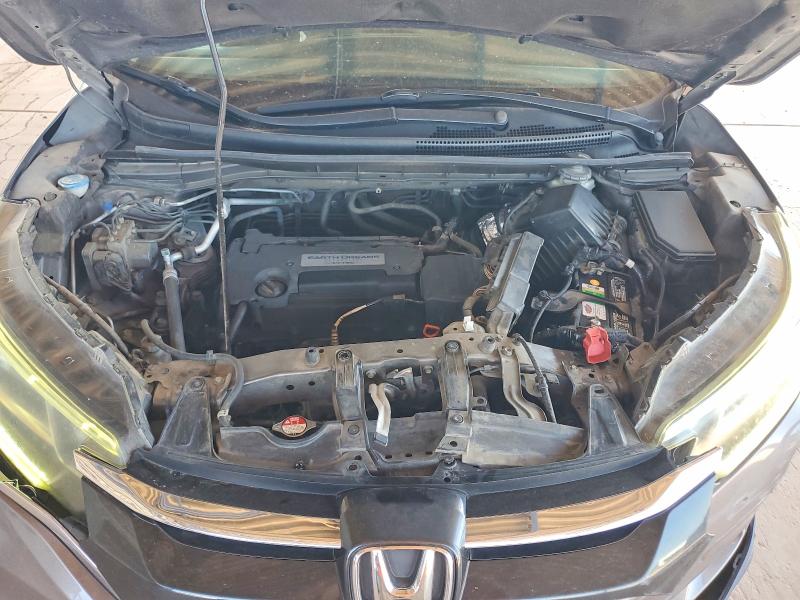 Photo 11 from auction – 2015 HONDA CR-V with VIN 3CZRM3H52FG701022