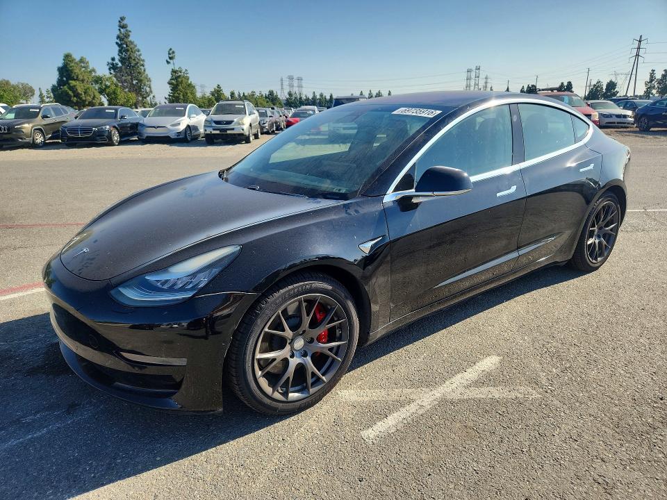 TESLA MODEL 3 2018 with VIN 5YJ3E1EB7JF083833 - Photo from auction