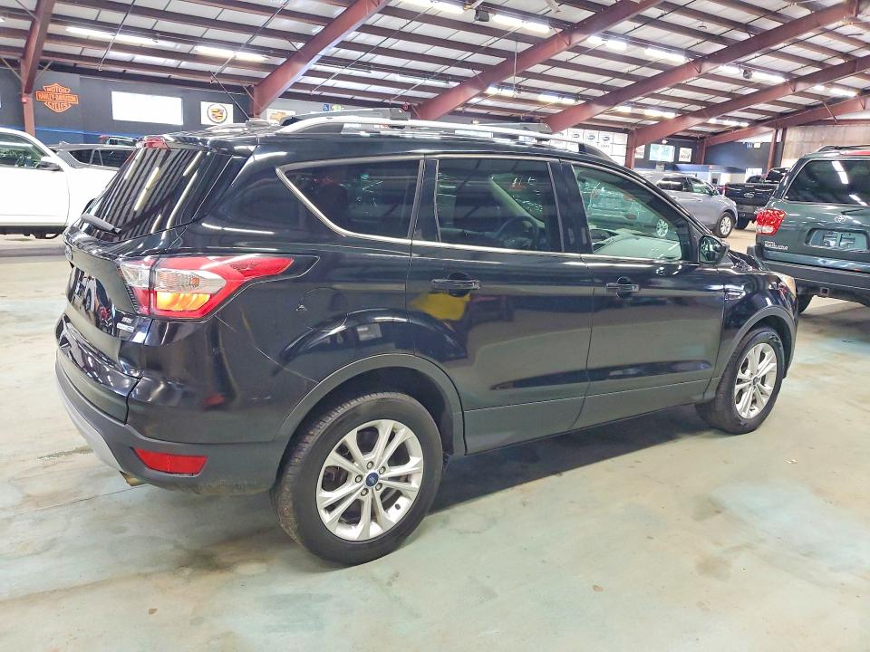 Photo 3 from auction – 2017 FORD ESCAPE with VIN 1FMCU9GD2HUF01017