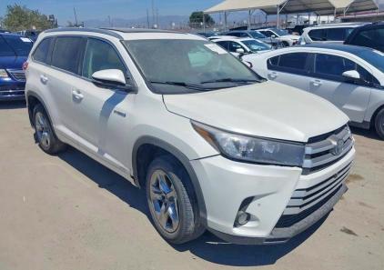 TOYOTA HIGHLANDER HYBRID 2019 with VIN 5TDDGRFH0KS059077 - Photo from auction