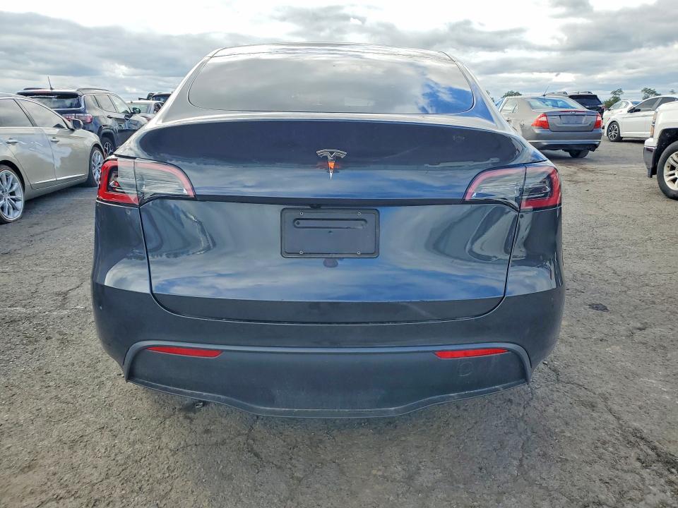 Снимка 6 от търг – 2024 TESLA MODEL Y с VIN 7SAYGDED6RF206765