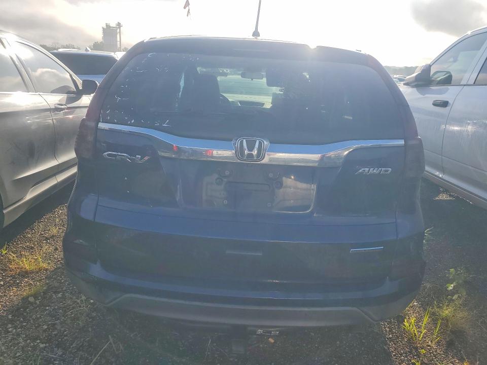 Photo 6 from auction – 2016 HONDA CR-V with VIN 5J6RM4H49GL028182