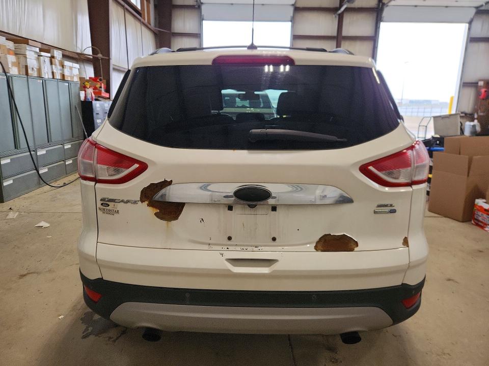 Photo 6 from auction – 2013 FORD ESCAPE with VIN 1FMCU9H96DUD60389