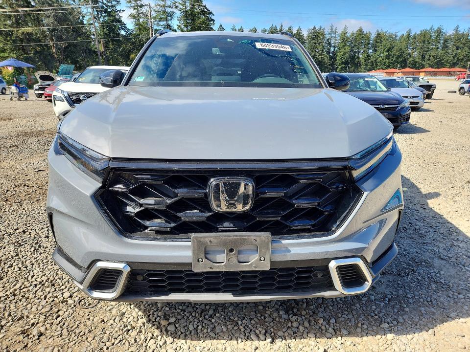 Photo 5 from auction – 2024 HONDA CR-V with VIN 2HKRS6H98RH804585