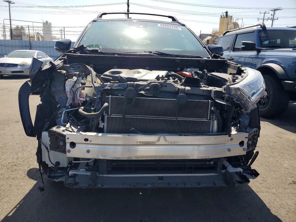 Photo 5 from auction – 2021 TOYOTA RAV4 with VIN 2T3E6RFV0MW012887