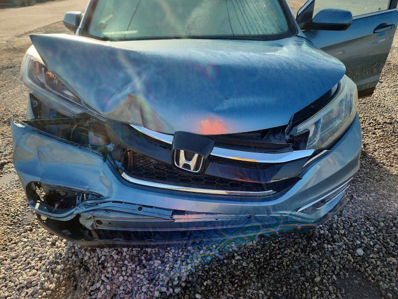 Photo 12 from auction – 2016 HONDA CR-V with VIN 2HKRM3H73GH568416