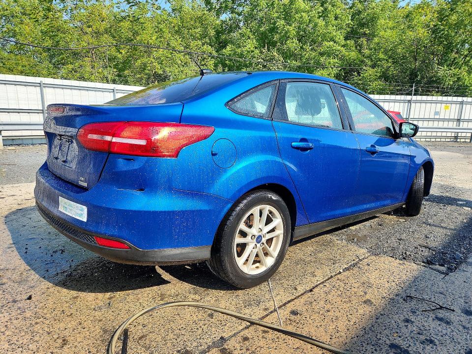 Foto 3 de la subasta – 2018 FORD FOCUS con VIN 1FADP3FE6JL299548