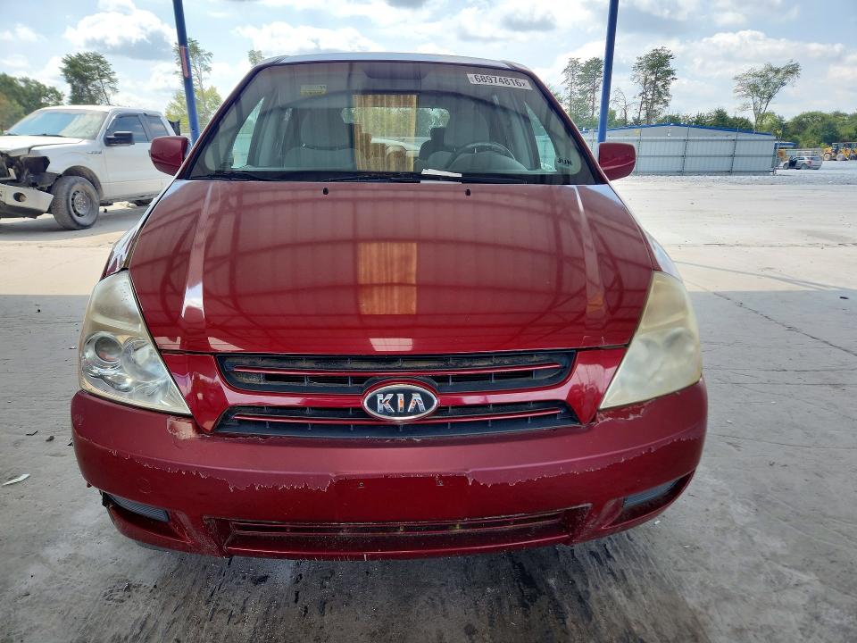 Photo 5 from auction – 2006 KIA SEDONA with VIN KNDMB233866029345