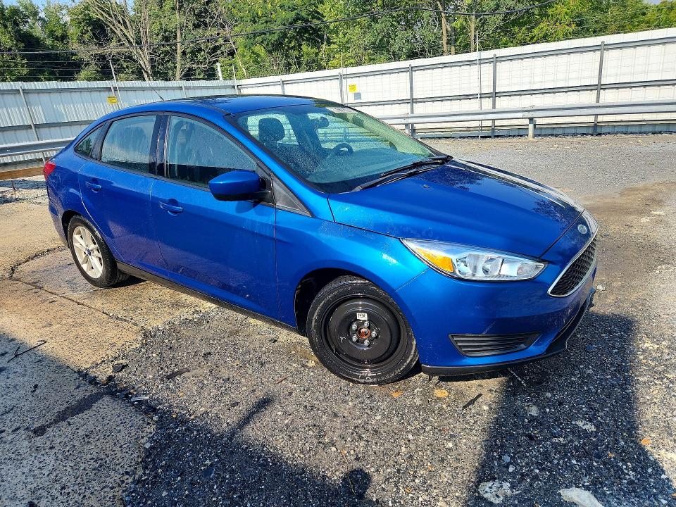Foto 4 de la subasta – 2018 FORD FOCUS con VIN 1FADP3FE6JL299548
