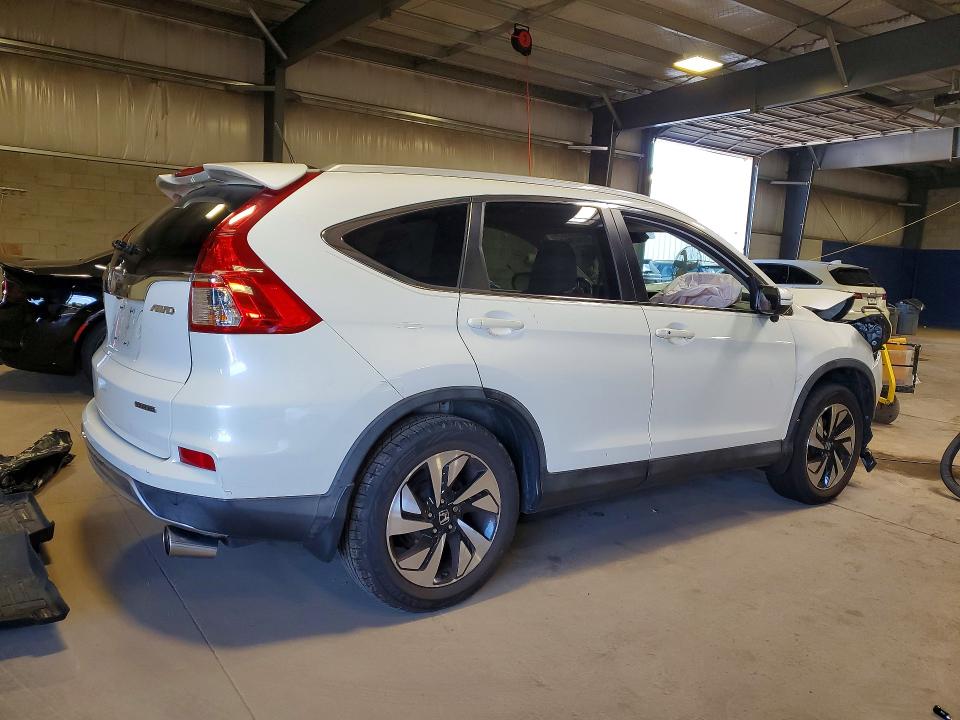 Photo 3 from auction – 2016 HONDA CR-V with VIN 5J6RM4H91GL092728