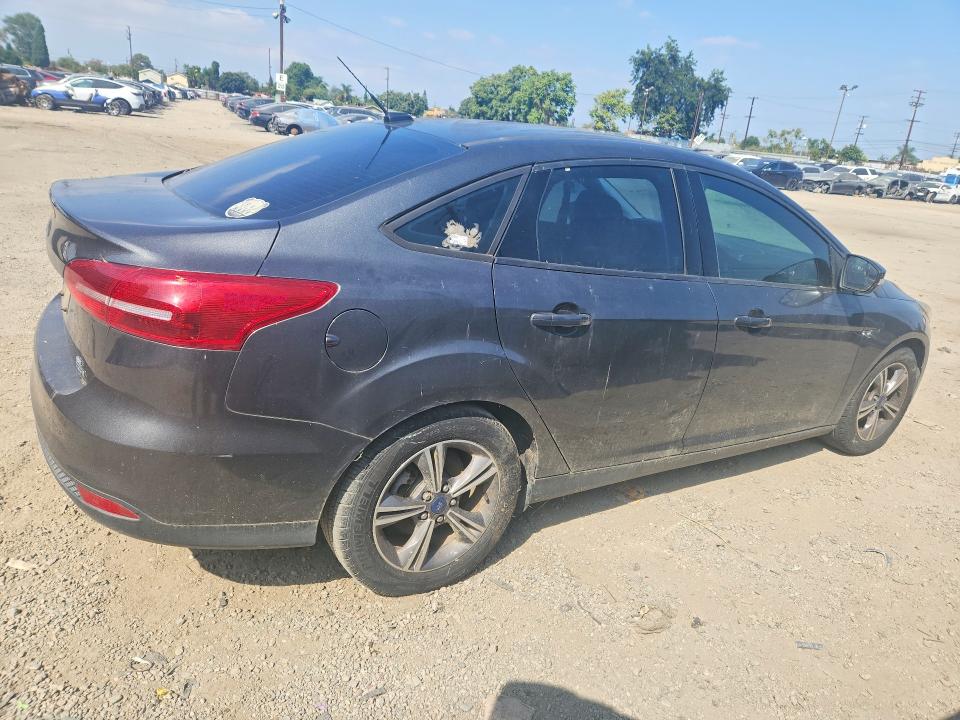 Photo 3 from auction – 2017 FORD FOCUS with VIN 1FADP3FE5HL306919