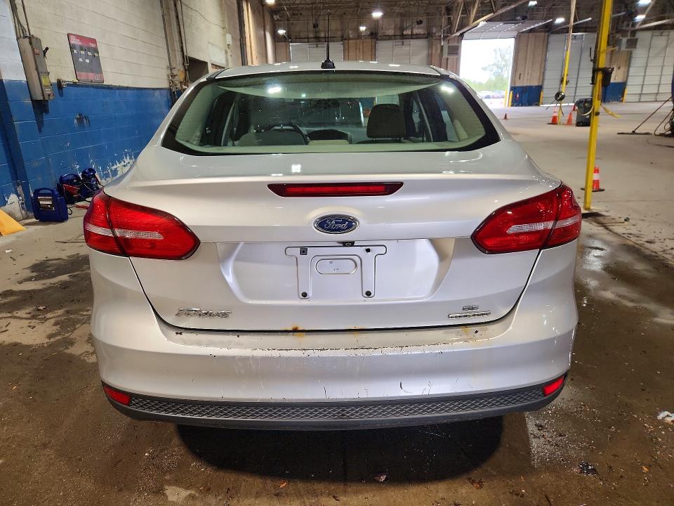 Photo 6 from auction – 2015 FORD FOCUS with VIN 1FADP3F2XFL205104