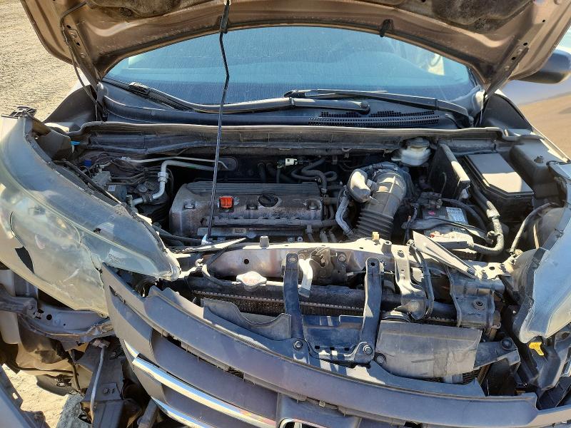 Снимка 12 от търг – 2014 HONDA CR-V с VIN 5J6RM4H3XEL013470