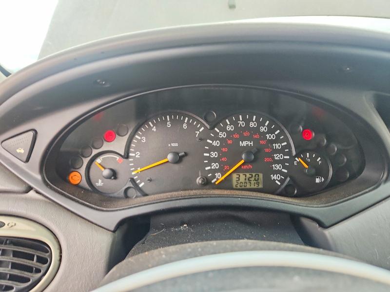 Фото 9 с аукциона – 2002 FORD FOCUS с VIN 3FAHP37382R219202