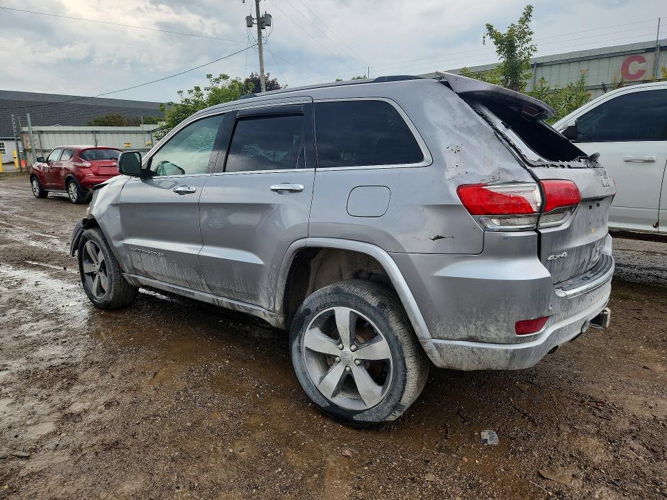 Снимка 2 от търг – 2014 JEEP GRAND CHEROKEE с VIN 1C4RJFCG2EC542528