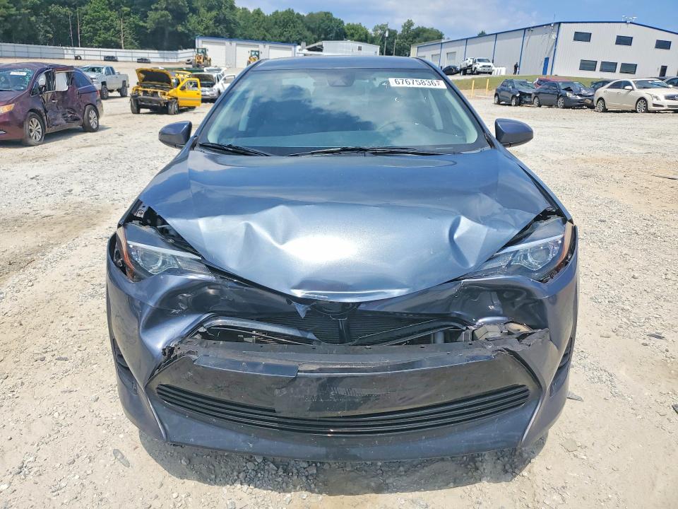 Photo 5 from auction – 2018 TOYOTA COROLLA with VIN 5YFBURHE2JP792998