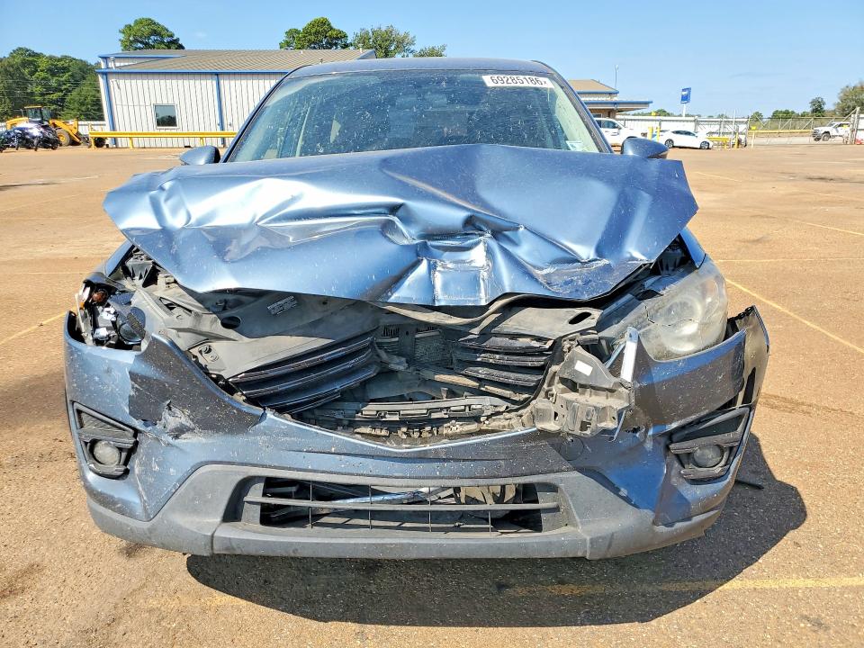 Photo 5 from auction – 2016 MAZDA CX-5 with VIN JM3KE2CYXG0671040