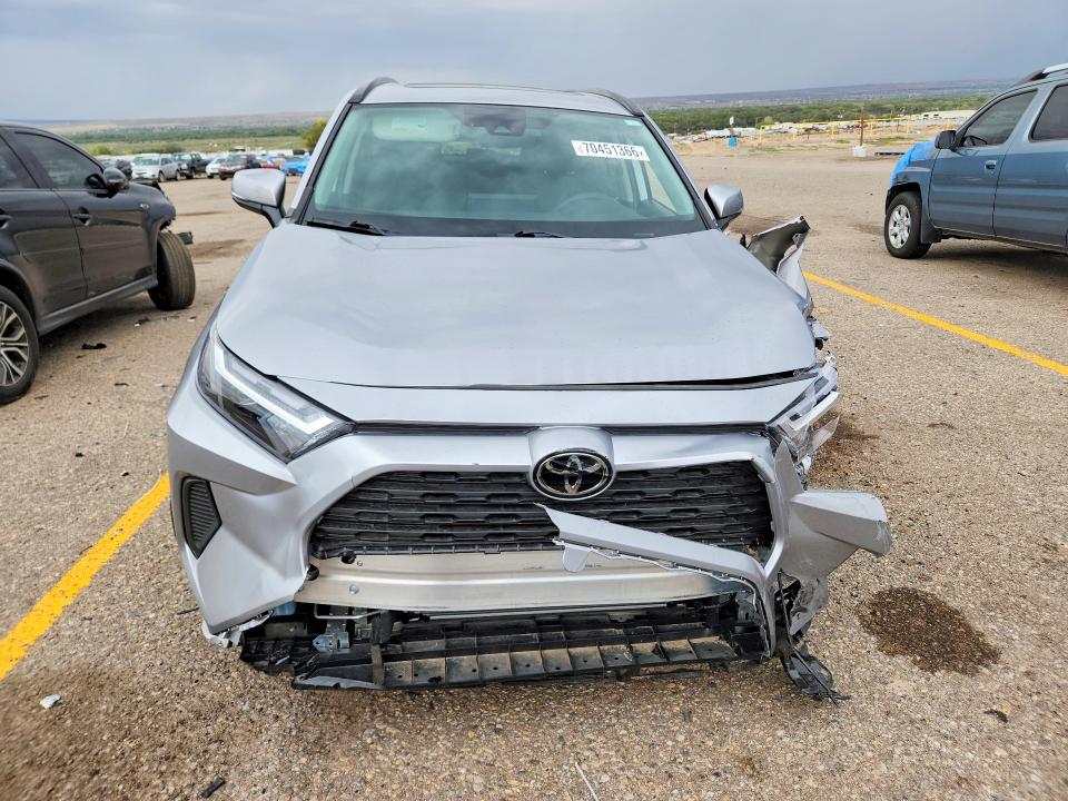 Photo 5 from auction – 2022 TOYOTA RAV4 with VIN 2T3P1RFV9NC302880