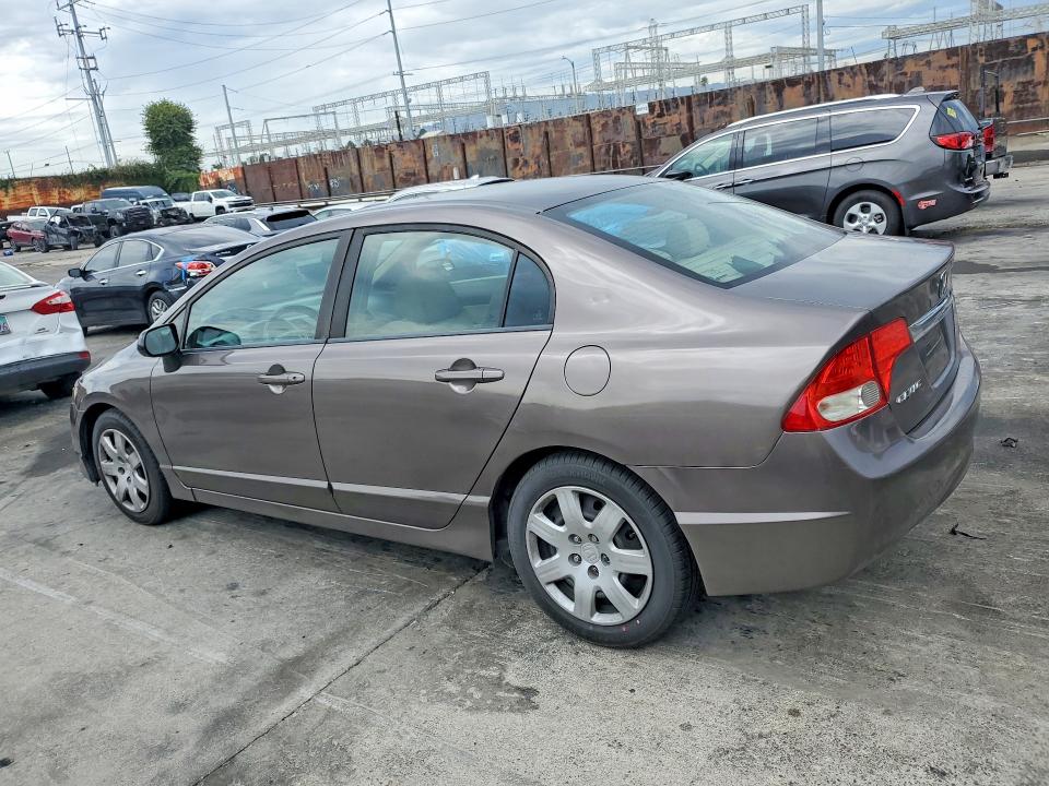 Photo 2 from auction – 2010 HONDA CIVIC with VIN 19XFA1F51AE009041
