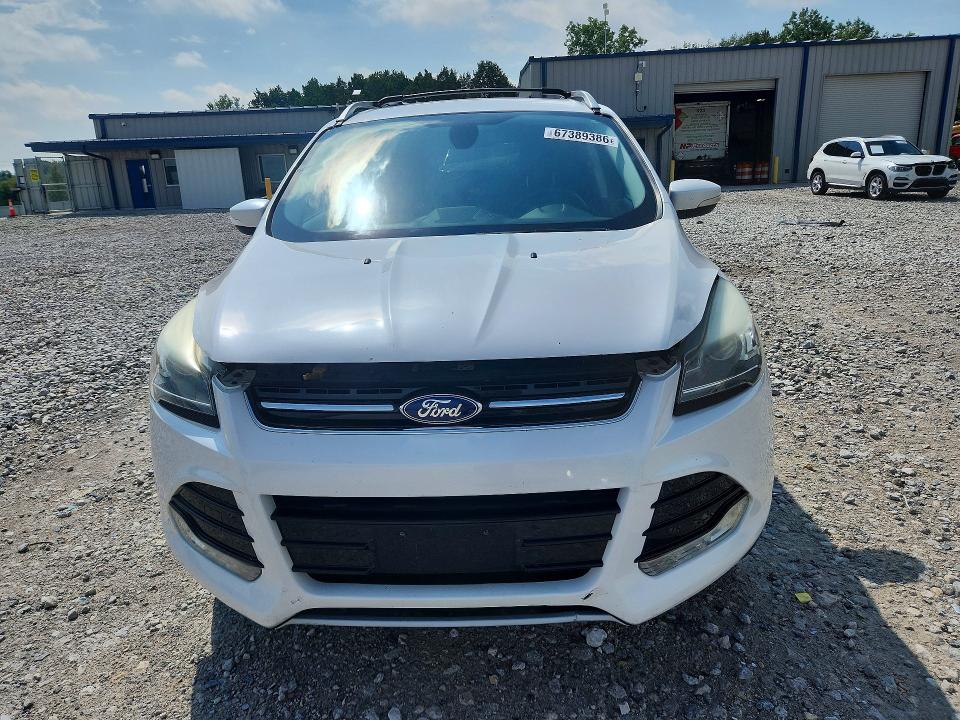 Photo 5 from auction – 2013 FORD ESCAPE with VIN 1FMCU9J93DUA76051