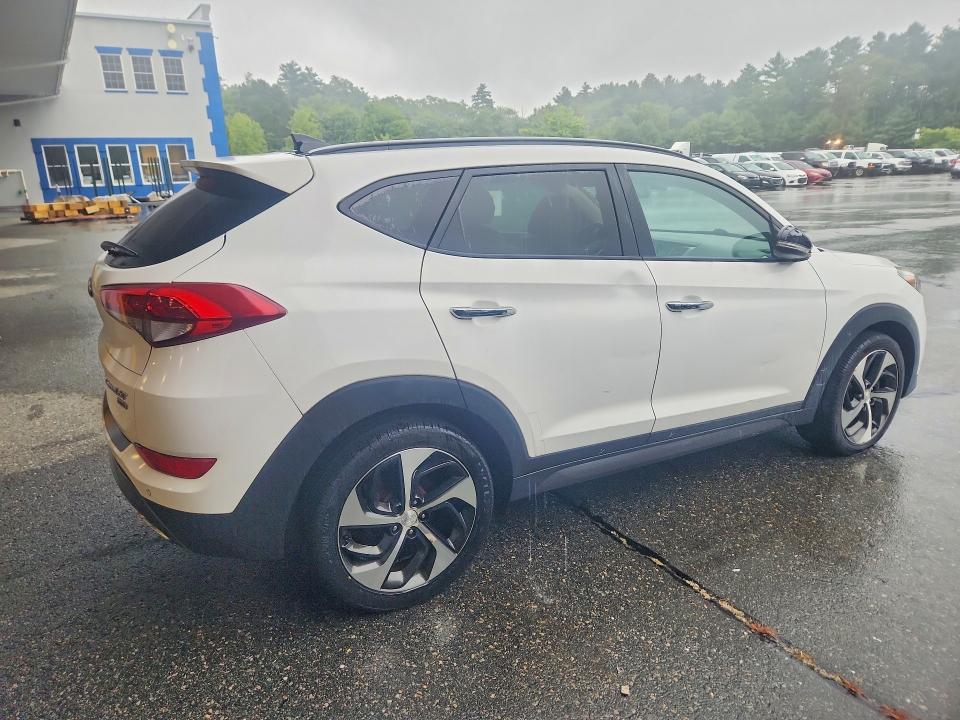 Photo 3 from auction – 2016 HYUNDAI TUCSON with VIN KM8J3CA20GU079164