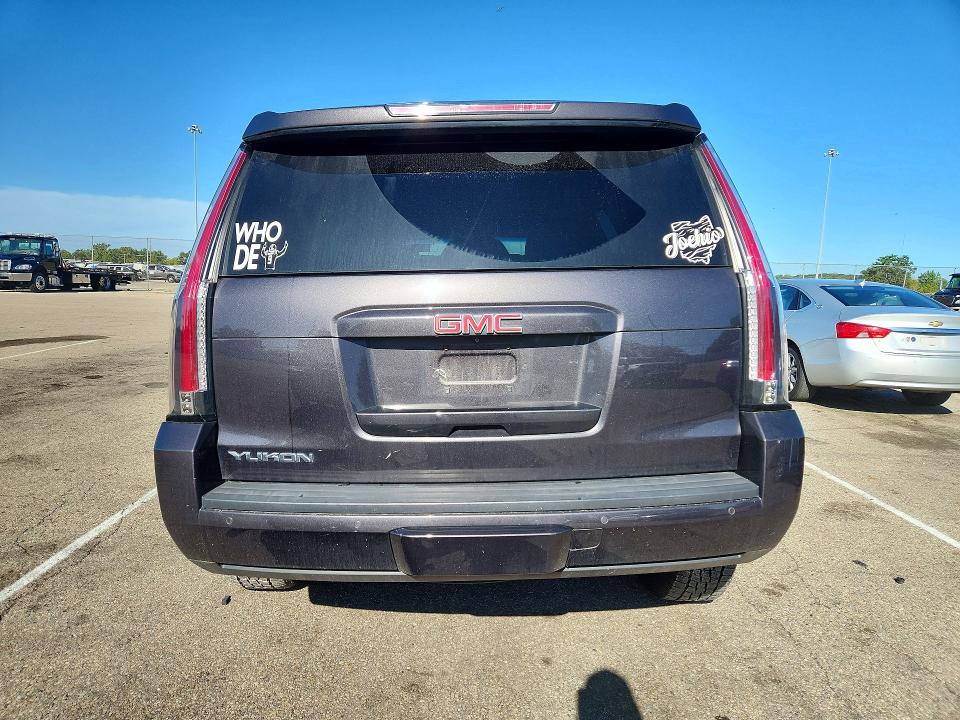Foto 6 de la subasta – 2016 GMC YUKON con VIN 1GKS2AKC2GR418523