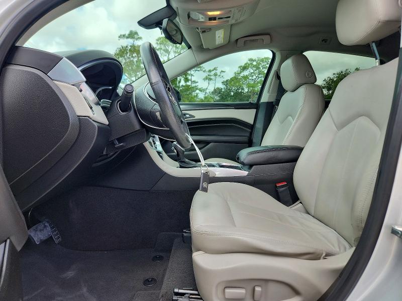 Фото 7 с аукциона – 2014 CADILLAC SRX с VIN 3GYFNAE33ES586319