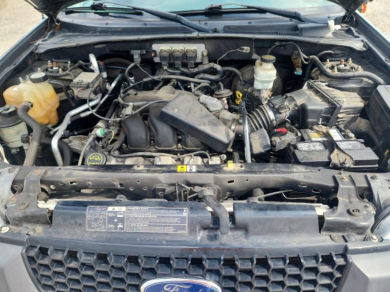 Photo 12 from auction – 2006 FORD ESCAPE with VIN 1FMYU03116KA86827