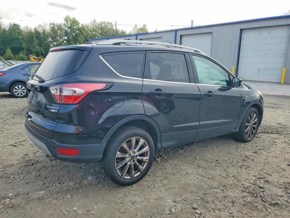 Photo 3 from auction – 2018 FORD ESCAPE with VIN 1FMCU9J94JUA38873