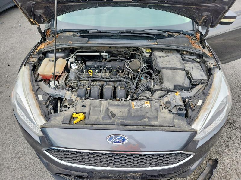 Photo 11 from auction – 2015 FORD FOCUS with VIN 1FADP3F25FL378951