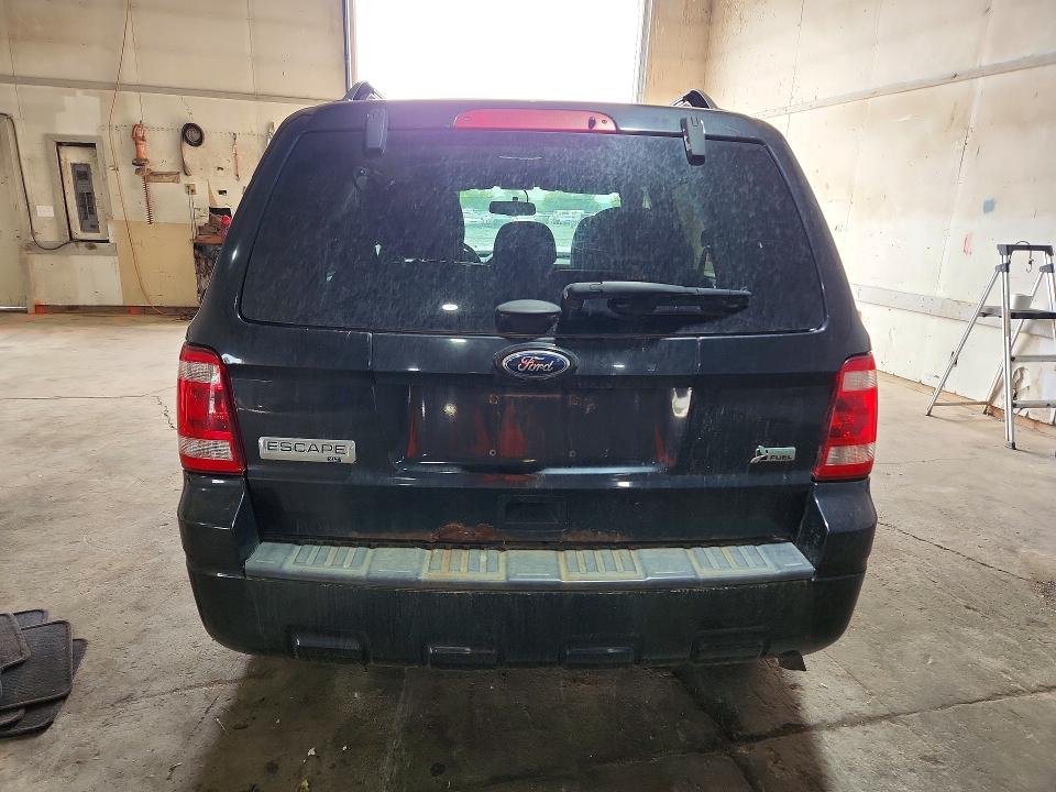 Photo 6 from auction – 2011 FORD ESCAPE with VIN 1FMCU0DG7BKA86676