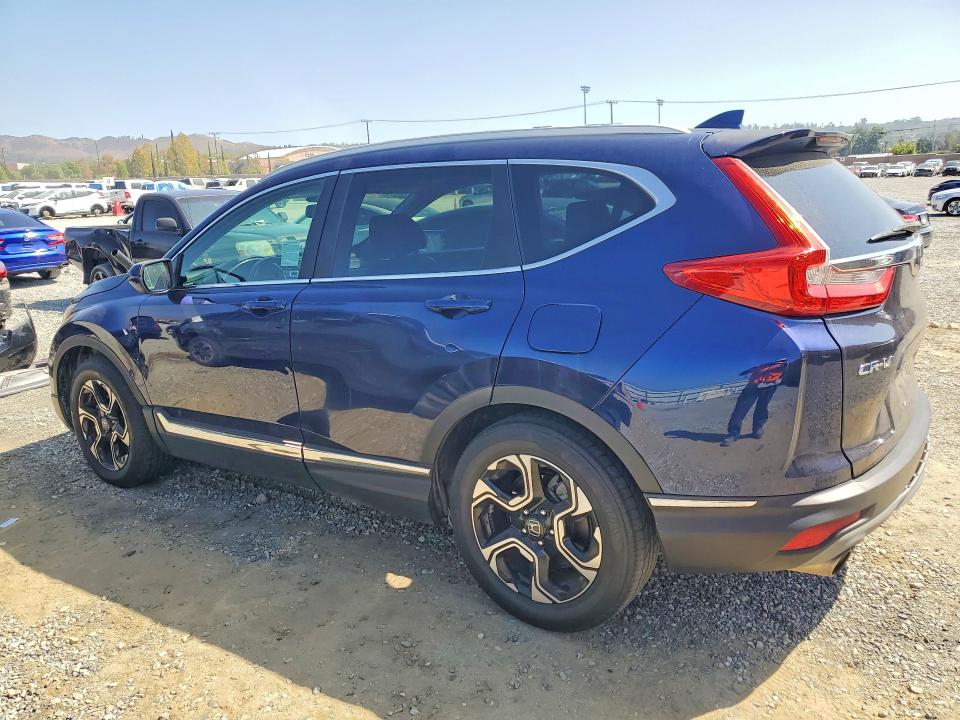 Photo 2 from auction – 2017 HONDA CR-V with VIN 2HKRW1H90HH506618