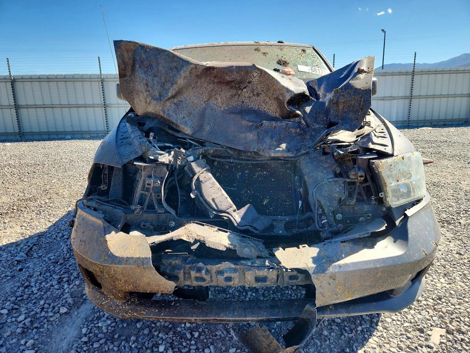 Photo 5 from auction – 2015 RAM 1500 with VIN 3C6JR7AG1FG525465
