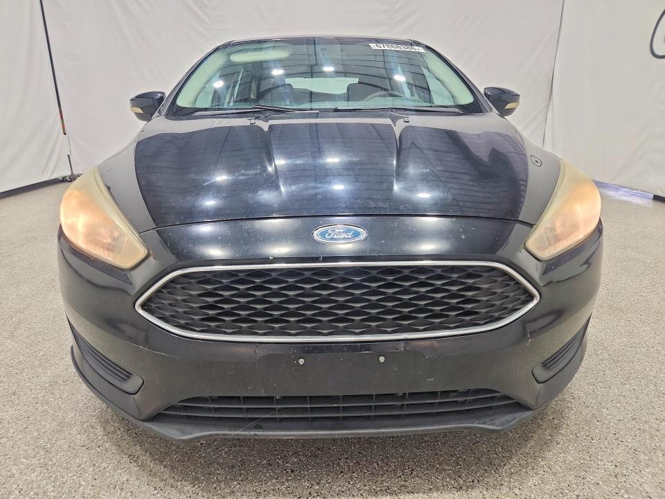 Foto 5 de la subasta – 2016 FORD FOCUS con VIN 1FADP3K21GL272083