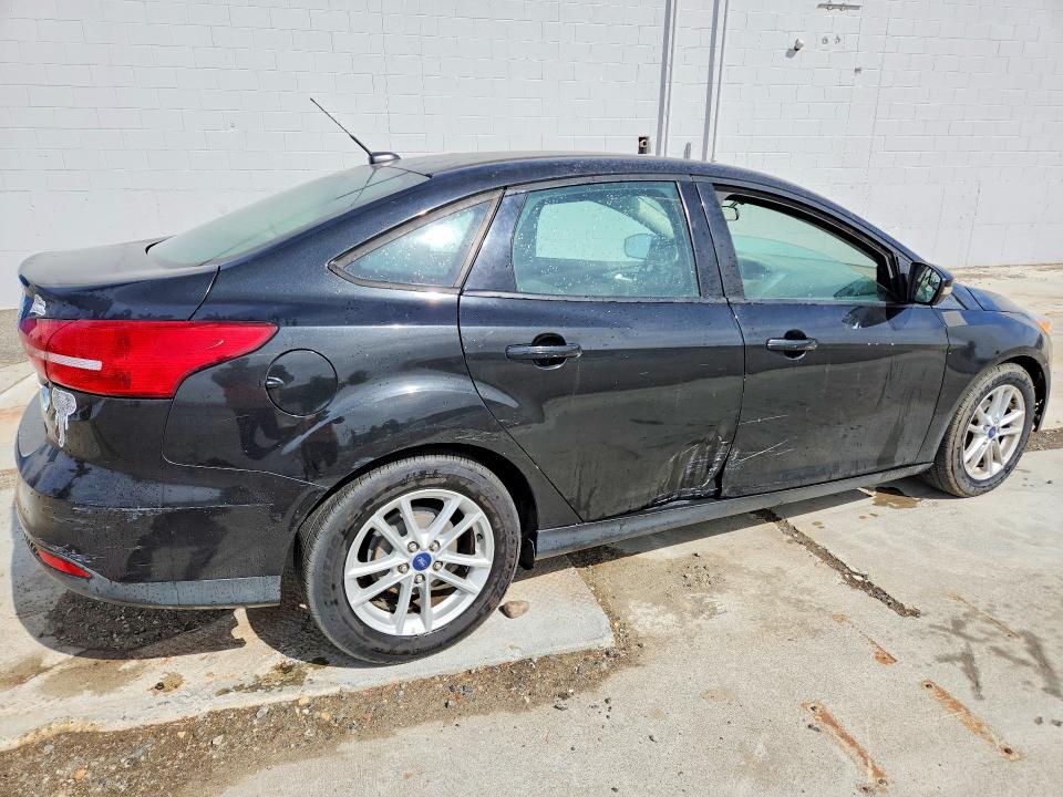 صورة رقم 3 من المزاد - 2015 FORD FOCUS مع VIN 1FADP3F24FL307742