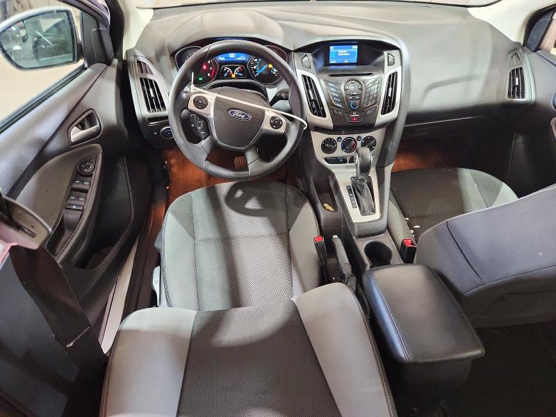 Photo 8 from auction – 2014 FORD FOCUS with VIN 1FADP3F28EL309847
