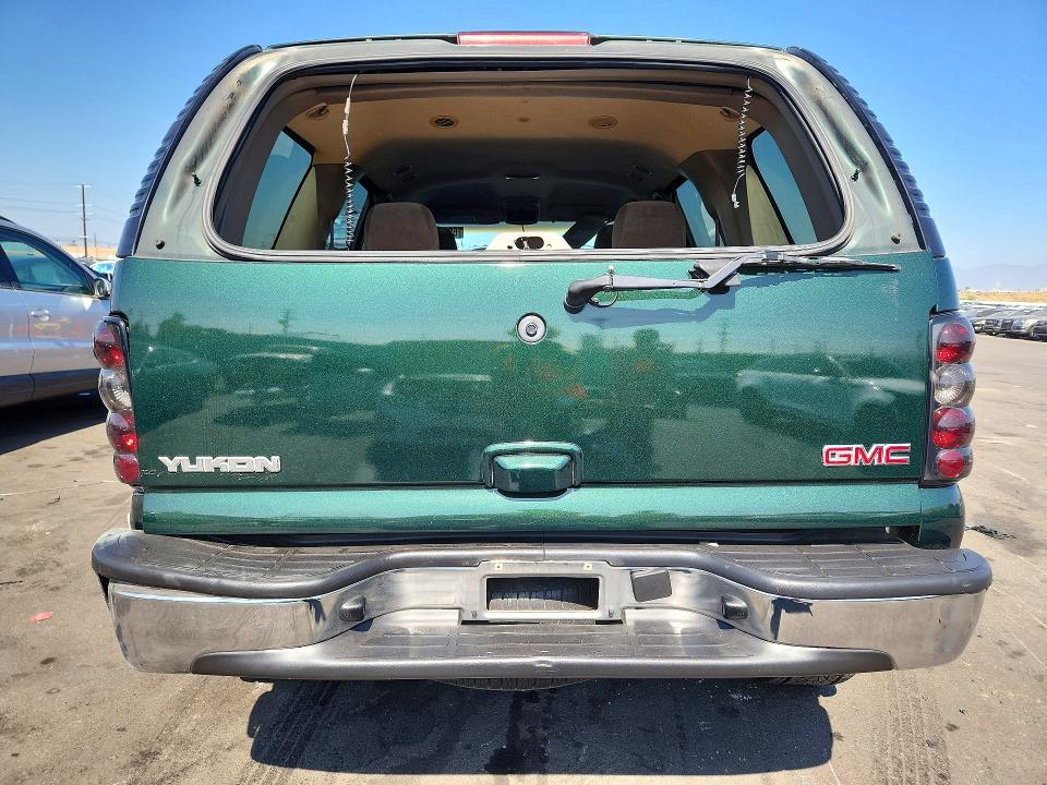 Снимка 6 от търг – 2003 GMC YUKON с VIN 1GKEC13VX3J301145
