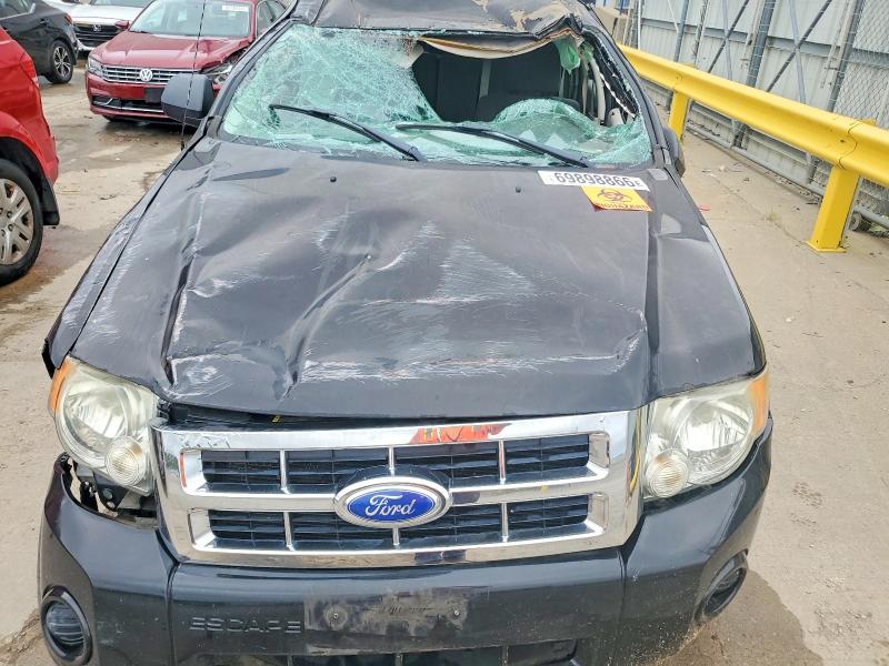 Снимка 12 от търг – 2011 FORD ESCAPE с VIN 1FMCU0C76BKC61582